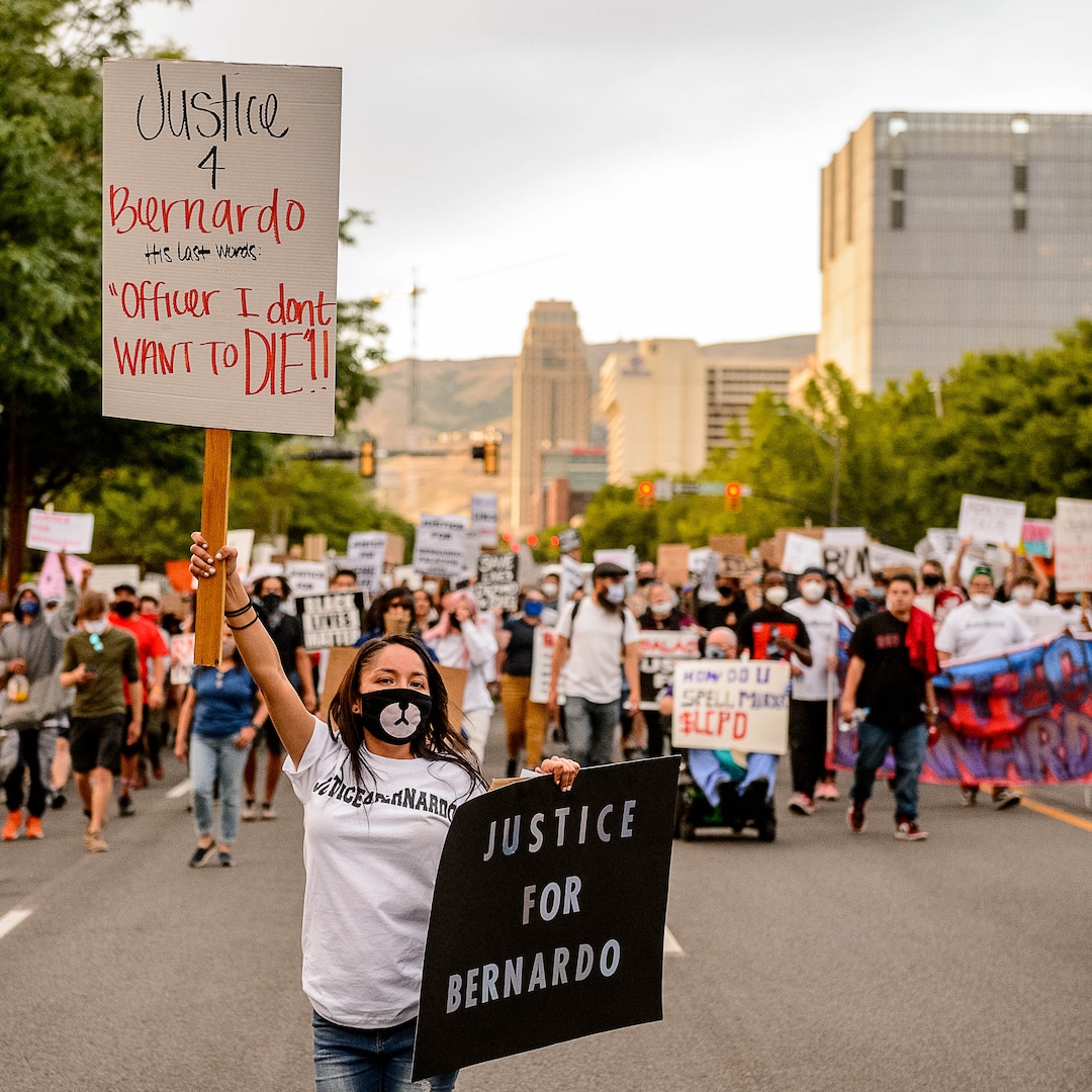 (Trent Nelson  |  The Salt Lake Tribune) People march against police brutality in Salt Lake City on Saturday, June 13, 2020.