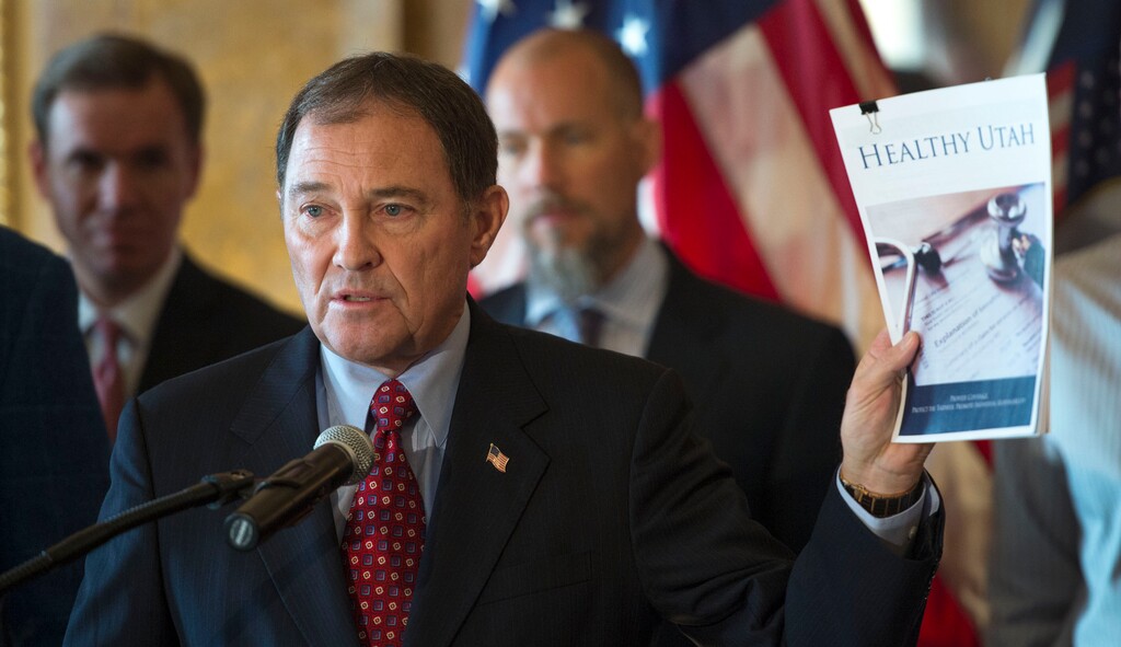 Steve Griffin  |  The Salt Lake TribuneGov. Gary Herbert addresses the media as he releases his detailed Healthy Utah plan, which is an alternative way to expanding health care coverage for the poor without technically expanding Medicaid. The plan was hammered out in months of negotiation this year with the U.S. Department of Health and Human Services. He was joined in the Gold Room at the Utah State Capitol by city and state leaders in Salt Lake City, Thursday, December 4, 2014. 