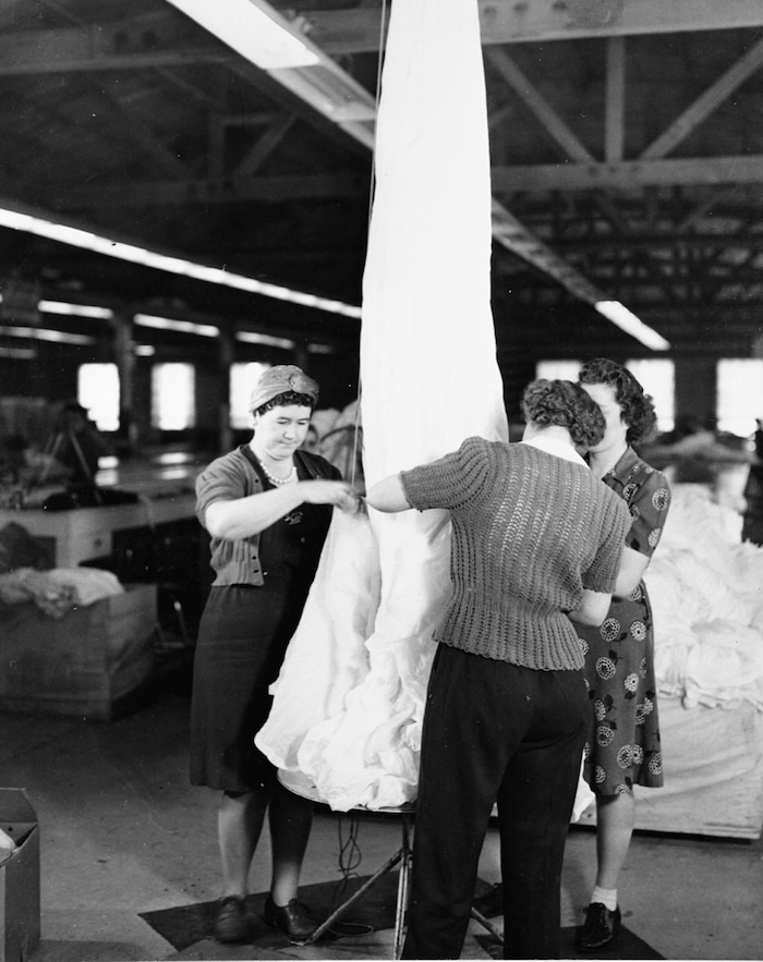 (Photo courtesy of the Utah State Historical Society) Women make parachutes in the mid-1940s in Manti, Utah.