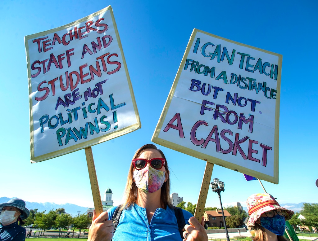 (Rick Egan  |  The Salt Lake Tribune file photo)   Teacher Cara Bailey joined protesters on Thursday, July 23, 2020, during the Mask-In and Car Caravan at the Capitol to demand the governor and other state and local leaders ensure that Utah schools protect students and staff when schools reopen.