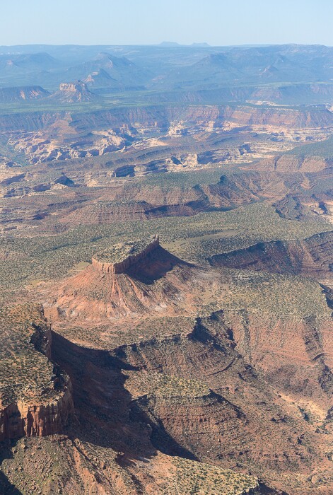 Francisco Kjolseth | The Salt Lake Tribune
The Bears Ears, seen on the horizon, and its surrounding areas in southeastern Utah, are subject to a possible National Monument designation by President Obama under the Antiquities Act for protection. EcoFlight recently flew journalists, tribal people and activists over the northern portion of the proposed 1.9 million acre site in an effort to push for permanent protection from impacts caused by resource extraction and high-impact public use.