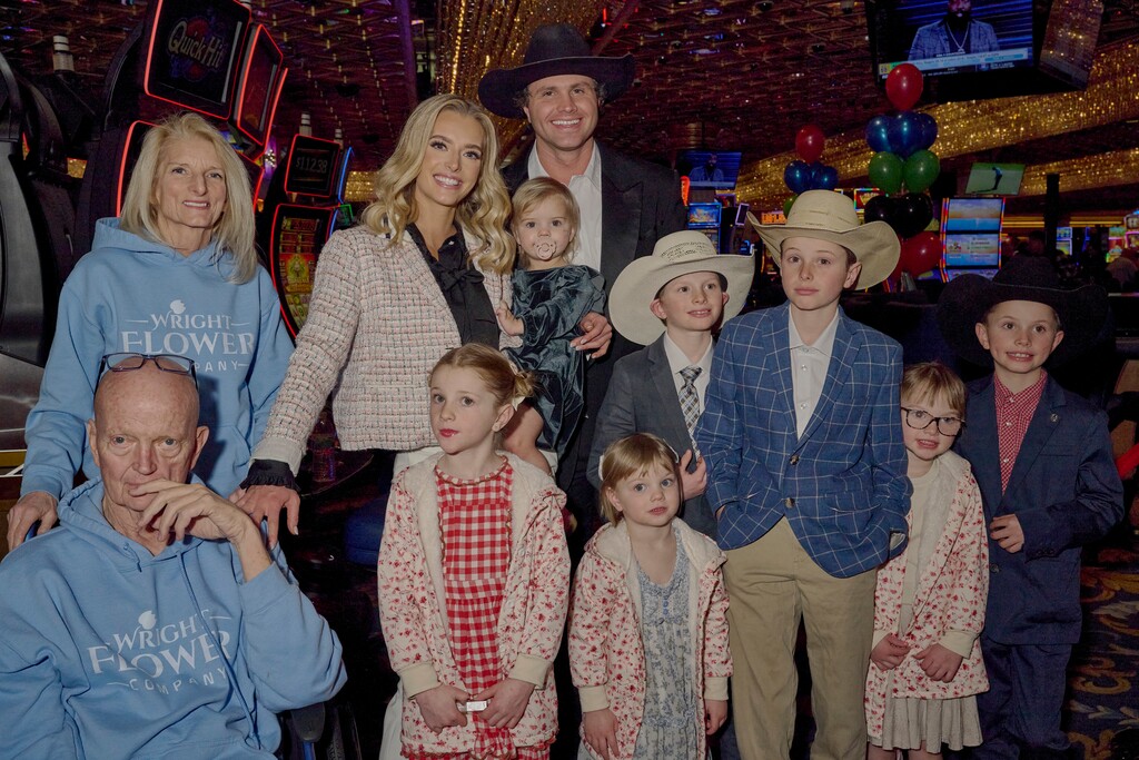 (Bridget Bennett | The New York Times) Hannah Neeleman, last year’s Mrs. American pageant winner, with her family during the Mrs. World beauty pageant at the Westgate Hotel and Casino in Las Vegas, Jan. 19, 2024. Online, Neeleman goes by the name Ballerina Farm, and millions of people watch her almost daily videos depicting her life with her husband and children in the countryside 30 miles from Salt Lake City.