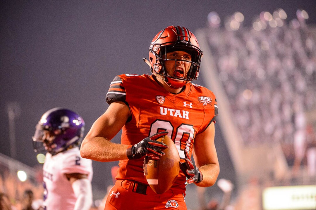 (Trent Nelson | The Salt Lake Tribune)  Utah Utes tight end Brant Kuithe (80) scores a touchdown as the University of Utah Utes host the Weber State Wildcats, Thursday Aug. 30, 2018 at Rice-Eccles Stadium in Salt Lake City.
