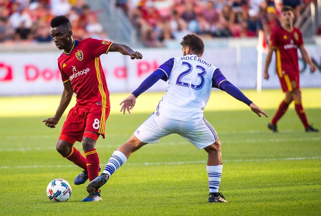 Chris Detrick | The Salt Lake Tribune
Real Salt Lake midfielder Stephen Sunny Sunday (8) and Orlando City SC midfielder Antonio Nocerino (23) go for the ball during the game at Rio Tinto Stadium Friday, June 30, 2017.