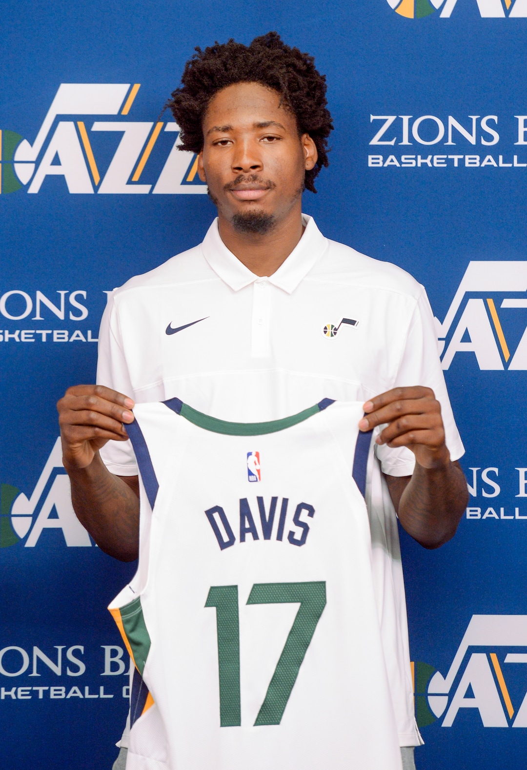 (Leah Hogsten  |  The Salt Lake Tribune) The Utah JazzÕs newest member, forward/center Ed Davis, holds his Jazz jersey, Friday, July 26, 2019 at the Jazz basketball facility.