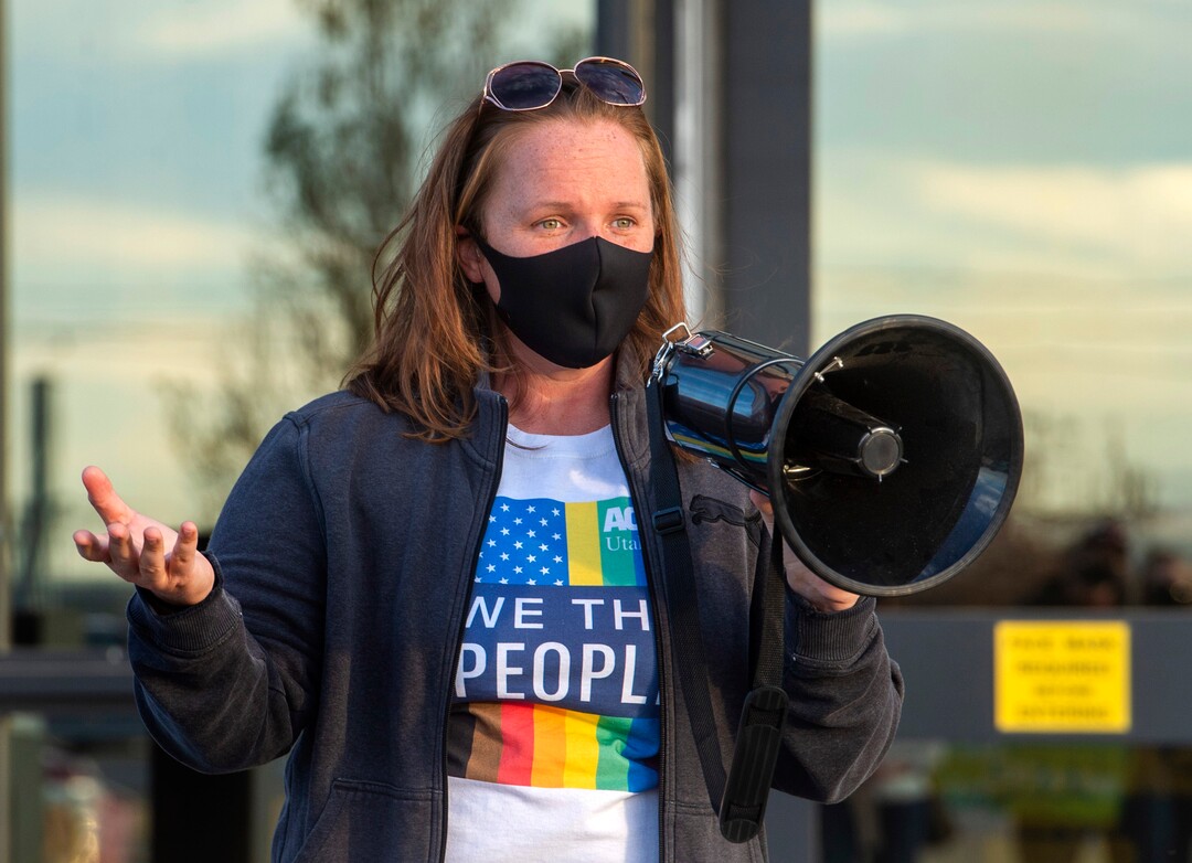(Rick Egan  |  The Salt Lake Tribune) Sydni Makemo, Southern Utah Outreach Coordinator for the American Civil Liberties Union, speaks at a rally for prison inmates, after a COVID-19 outbreak has spread at the Draper prison, at the Department of Corrections, on Tuesday, Oct. 13, 2020.Sidni Makemo Outreach