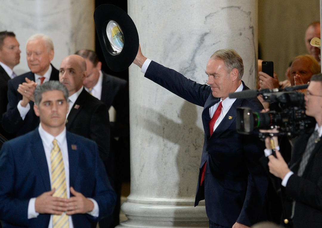 (Francisco Kjolseth  |  The Salt Lake Tribune)  Interior Secretary Ryan Zinke is acknowledged by U.S. President Donald Trump on stage at the Utah Capitol on Monday, Dec. 4, 2017, moments before signing two presidential proclamation to shrink Bears Ears and Grand Staircase-Escalante national monuments.