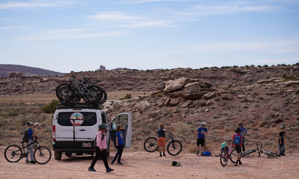 (Francisco Kjolseth  | The Salt Lake Tribune) A bike tour group of young students explore the extensive trails that could soon be incorporated into Utahraptor State Park outside of Moab, Utah, on Monday April 12, 2021. 