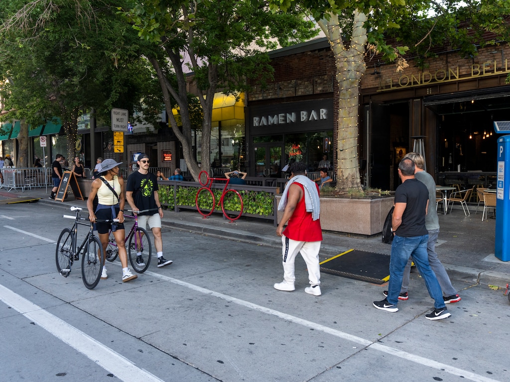 (Rick Egan | Tribune file photo)  Pedestrians stroll in the open streets portion of Salt Lake City's Main Street, on Saturday, Aug. 13, 2022. Mayor Erin Mendenhall would like to see this segment of Main blocked off to automobile traffic permanently.