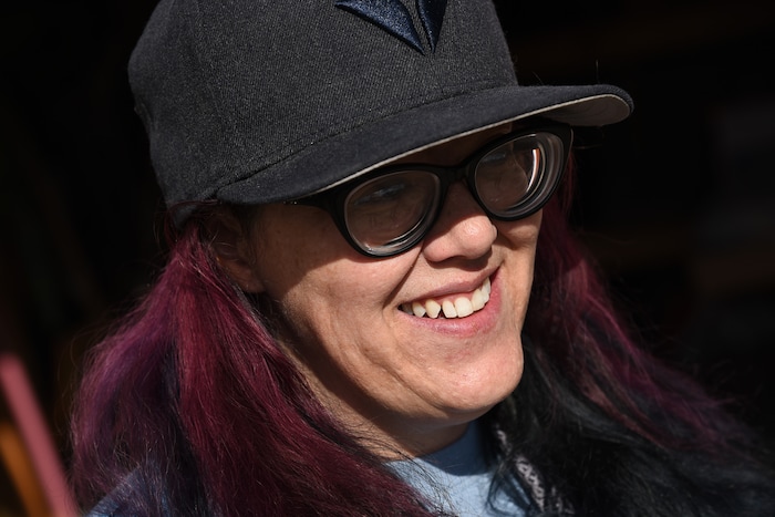 (Francisco Kjolseth  |  The Salt Lake Tribune)  Jenn Harris, a former recovery resident at the Center for Women and Children in Murray, loves volunteering her time now at the Freedom Garden across the street from the center, where residents can learn how to grow fruits and vegetables and make strides towards rehabilitation. The garden has been a place of healing and also acts as a memorial for those who have passed in their battle with substance abuse with stones bearing their names in the garden. 