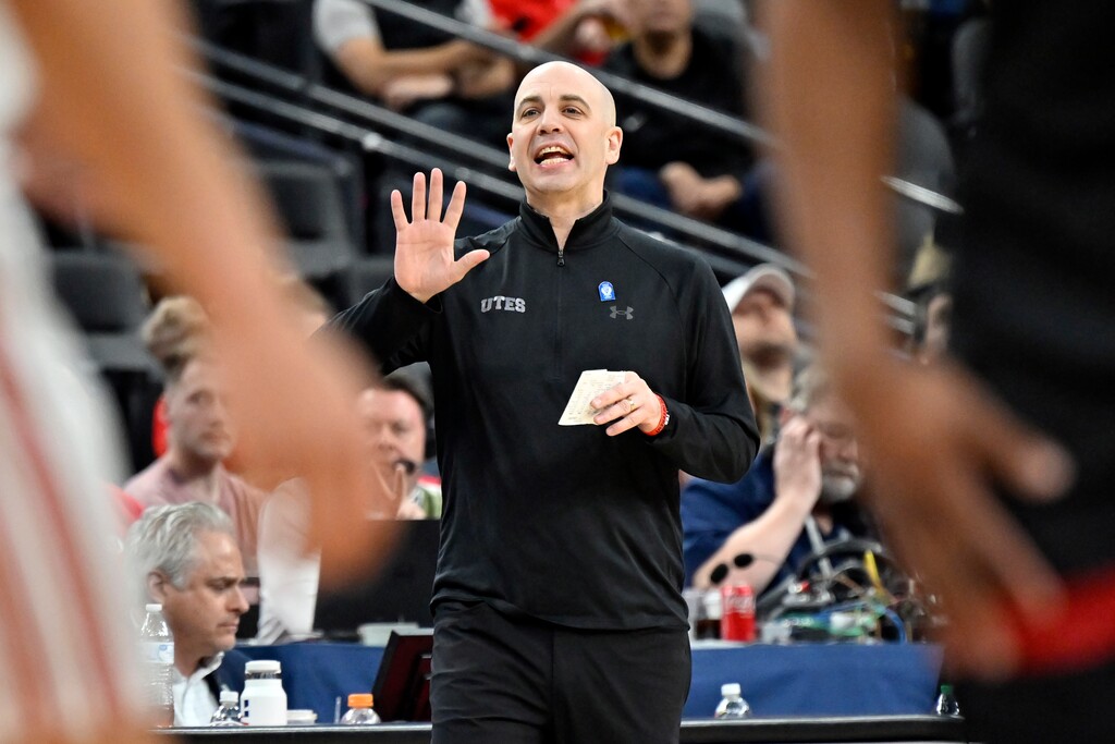 (David Becker | AP) Utah head coach Craig Smith calls to his team during the second half of an NCAA college basketball game against Stanford in the first round of the Pac-12 men's tournament Wednesday, March 8, 2023, in Las Vegas.