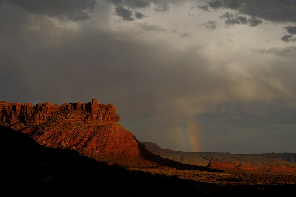 (Leah Hogsten | The Salt Lake Tribune) A rainbow appears in Valley of the Gods, a Bureau of Land Management-designated Area of Critical Environmental Concern, in 2020. A new rule from the BLM prioritizes the creation of ACECs for building resilience to climate change.