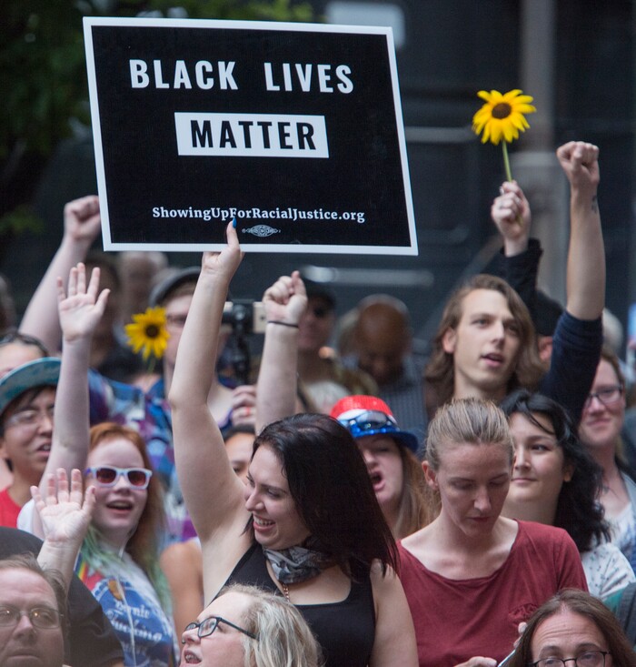 (Rick Egan  |  The Salt Lake Tribune)  Crowds cheer at the Charlottesville Va. solidarity rally, hosted by Utah League of Native American Voters, at the City and County Building, Monday, August 14, 2017.


