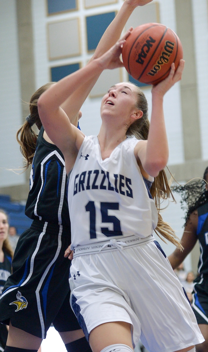 (Leah Hogsten  |  The Salt Lake Tribune)   Copper Hills High School girls' basketball team defeated Pleasant Grove High School 66-25 during their Class 6A girls' basketball playoff opener at Salt Lake Community College Tuesday, Feb. 20, 2018. 