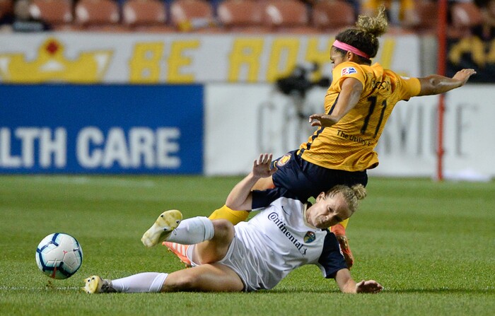(Francisco Kjolseth  |  The Salt Lake Tribune)  Utah Royals FC midfielder Desiree Scott (11) ends up on top of North Carolina Courage forward Kristen Hamilton (23) as Utah Royals FC hosts the North Carolina Courage at Rio Tinto Stadium in Sandy, Utah on Saturday, July 27, 2019.