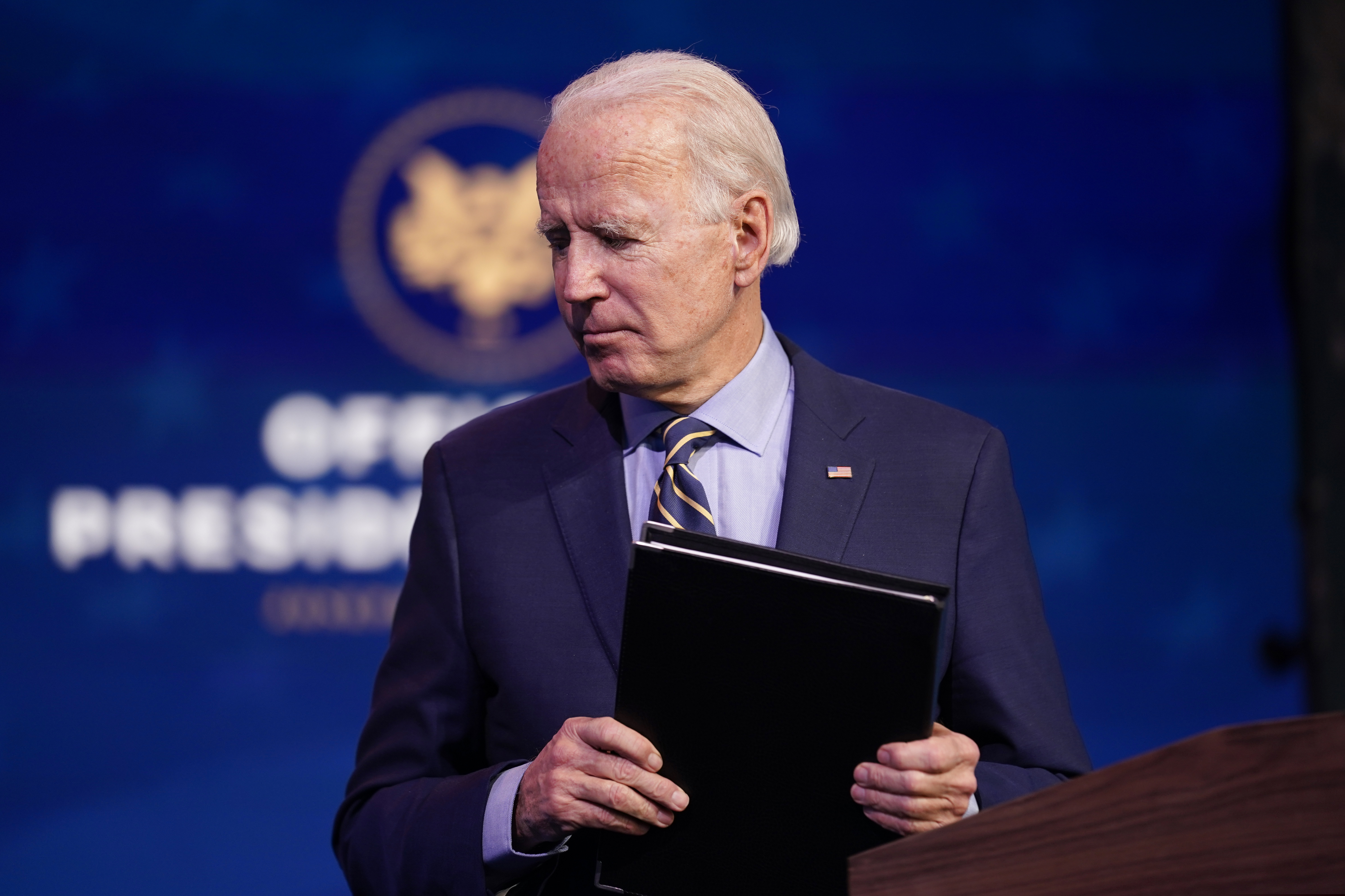 (Andrew Harnik | AP file photo)  President-elect Joe Biden leaves after speaking at The Queen theater, Monday, Dec. 28, 2020, in Wilmington, Del.