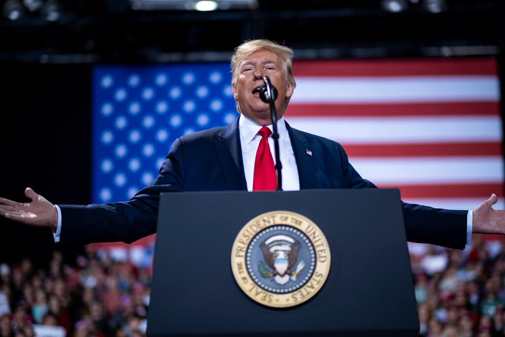 (Pete Marovich | The New York Times) President Donald Trump speaks at a campaign rally at Kellog Arena in Battle Creek, Mich., Dec. 18, 2019. The U.S. House voted to impeach Trump the same day.