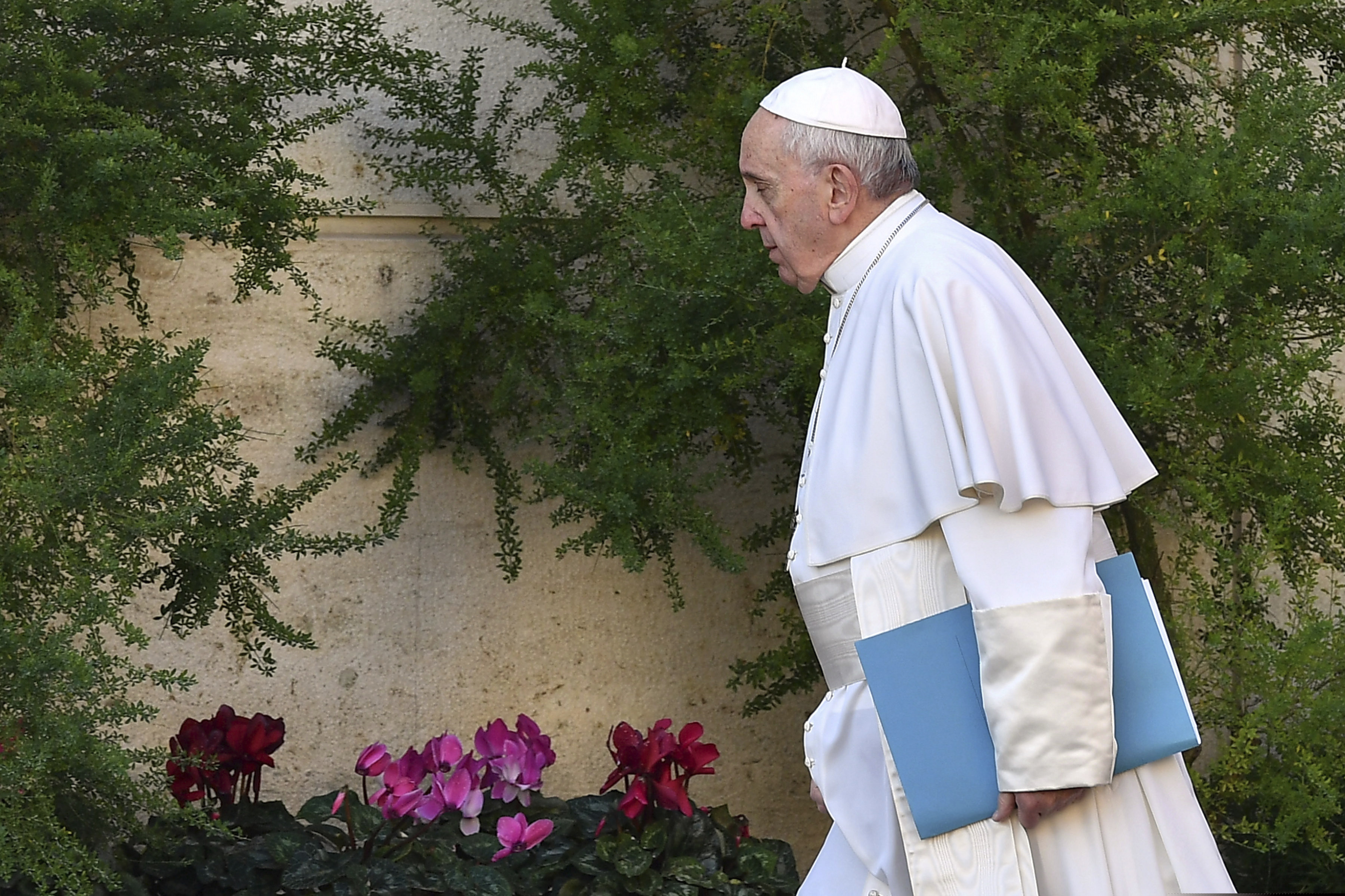 (Vincenzo Pinto/Pool Photo via AP) Pope Francis arrives for the opening of a sex abuse prevention summit, at the Vatican, Thursday, Feb. 21, 2019. The gathering of church leaders from around the globe is taking place amid intense scrutiny of the Catholic Church's record after new allegations of abuse and cover-up last year sparked a credibility crisis for the hierarchy.