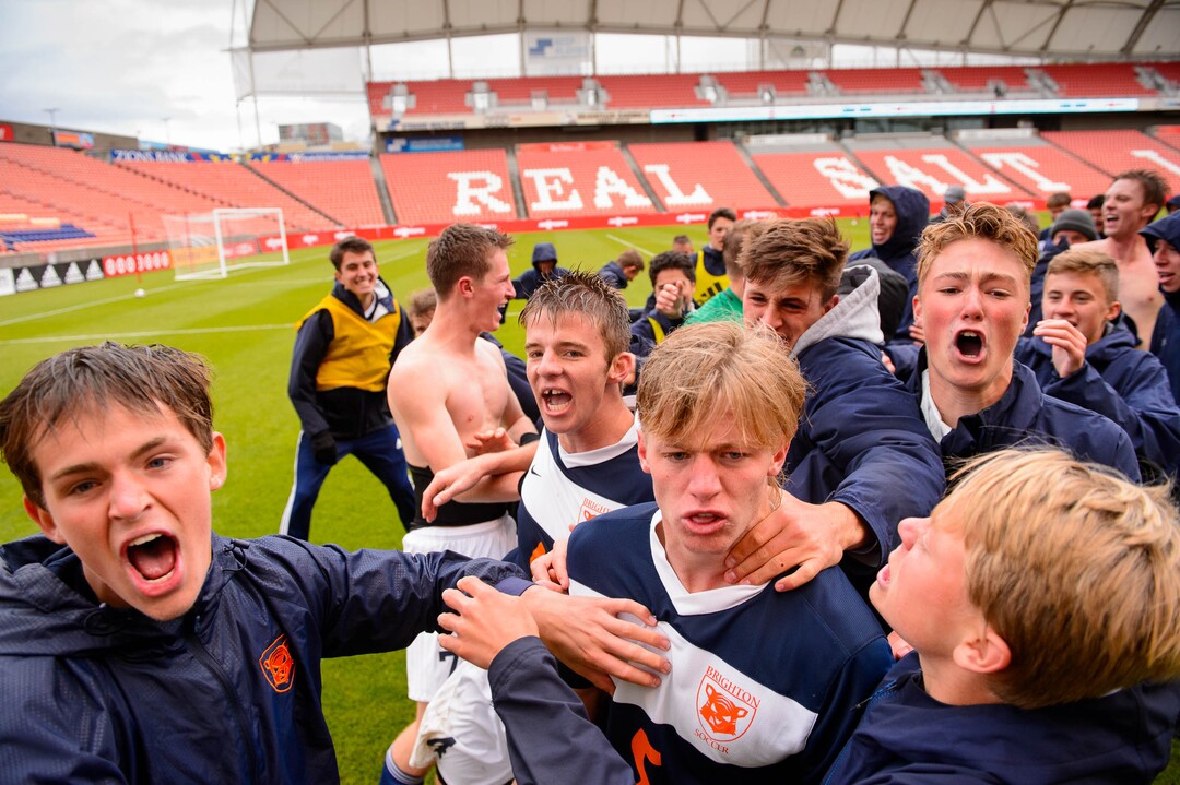 (Trent Nelson  |  The Salt Lake Tribune)  Brighton players celebrate after defeating Olympus High School 3-2 in overtime in the 5A boys state championship game at Rio Tinto Stadium in Sandy, Thursday May 23, 2019. At center is Brighton's Braxton Jones (5).