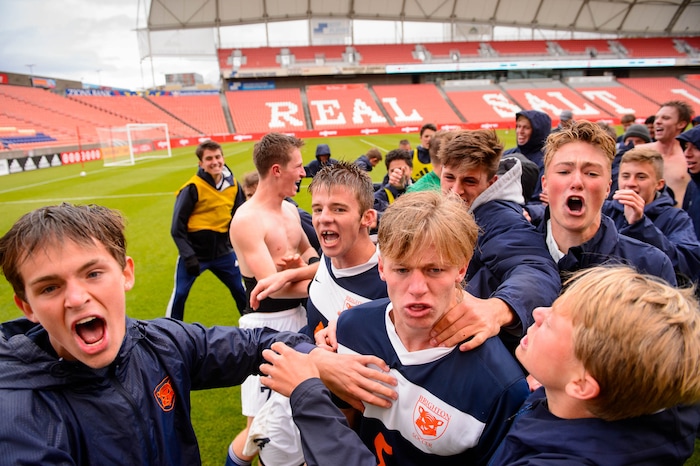 (Trent Nelson  |  The Salt Lake Tribune)  
Brighton players celebrate after defeating Olympus High School 3-2 in overtime in the 5A boys state championship game at Rio Tinto Stadium in Sandy, Thursday May 23, 2019. At center is Brighton's Braxton Jones (5).