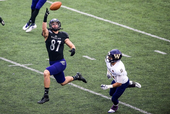 (Chris Detrick  |  The Salt Lake Tribune)  Weber State Wildcats tight end Andrew Vollert (87) makes a one-handed catch past Western Illinois Leathernecks defensive back Eric Carrera (11) during the game at Stewart Stadium Saturday, November 25, 2017.  