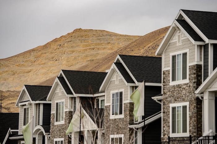 (Trent Nelson | The Salt Lake Tribune)
Homes at Traverse Ridge near a mining operation, Friday Nov. 23, 2018. The city of Lehi has sent a letter of assurance to residents saying there are no health risks from the gravel mining and construction on Point of the Mountain. They site a health department study showing the operation is not causing health-damaging air pollution. The health department tells a different story -- and they can't say there are no health risks from the mining.