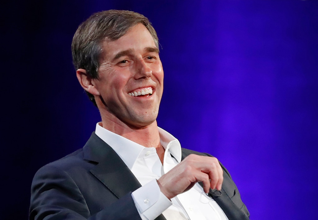 FILE - In this Tuesday, Feb. 5, 2019 file photo, former Democratic Texas congressman Beto O'Rourke laughs during a live interview with Oprah Winfrey on a Times Square stage at "SuperSoul Conversations," in New York. O'Rourke formally announced Thursday that he'll seek the 2020 Democratic presidential nomination, ending months of intense speculation over whether he'd try to translate his newfound political celebrity into a White House bid. (AP Photo/Kathy Willens, File)