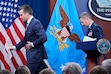 Defense Secretary Pete Hegseth and Joint Chiefs Chairman Gen. Dan Caine depart at the end of a news conference at the Pentagon in Washington, Sunday, June 22, 2025, after the U.S. military struck three sites in Iran, directly joining Israel's effort to destroy the country's nuclear program. (AP Photo/Alex Brandon)