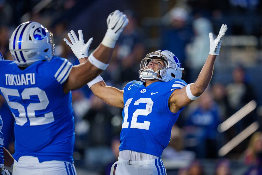 (Trent Nelson | The Salt Lake Tribune) Brigham Young Cougars wide receiver Puka Nacua (12) celebrates a touchdown as BYU hosts East Carolina, NCAA football in Provo on Friday, Oct. 28, 2022.