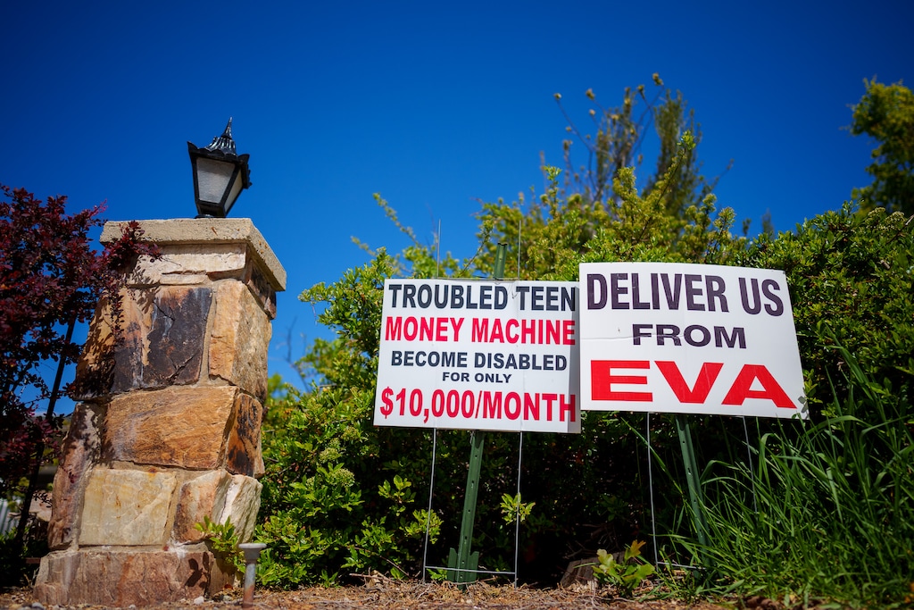 (Trent Nelson | The Salt Lake Tribune) Signs in a neighborhood near Eva Carlston Academy, a youth treatment center for girls located in a home in a Salt Lake City suburb, on Tuesday, May 24, 2022.