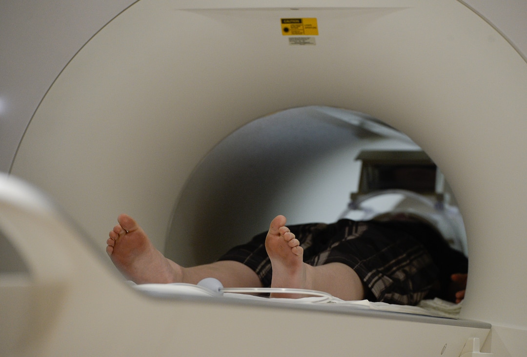 Francisco Kjolseth | The Salt Lake TribuneBryce Hortin, 11, of Syracuse is positioned in the machine that will periodically capture images of his brain over a 10-year study. At the U of U, psychology professor Deborah Yurgelun-Todd aims to enroll 1,000 Utahns into a study that will ultimately include 12,000 across the country to monitor kids in their preteen and teen years.