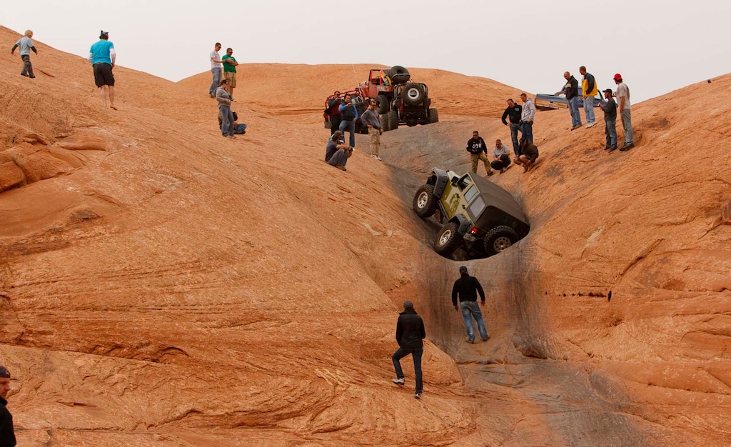 Trent Nelson  |  The Salt Lake TribuneA jeep, stuck in the "Escalator" on the Hell's Revenge 4x4 Trail, as thousands of Jeeps descended on the trails surrounding Moab for the annual Easter Jeep Safari, Friday April 10, 2009.