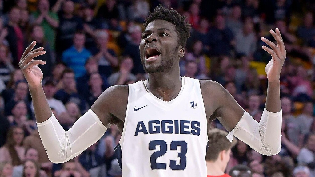 Utah State center Neemias Queta (23) motions to the crowd after scoring a basket against New Mexico during an NCAA basketball game, Wednesday, Feb. 20, 2019, in Logan, Utah. (Eli Lucero/Herald Journal via AP)