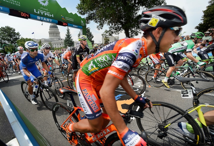 (Scott Sommerdorf   |  The Salt Lake Tribune)   Riders begin the rolling, or "neutral" start of the 2017 Tour of Utah, Sunday, August 6, 2017.  
