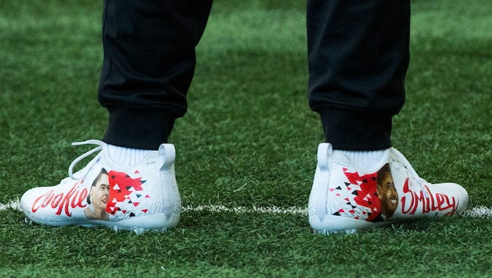 (Rick Egan  |  The Salt Lake Tribune)      Troy Williams wears custom made shoes that honor his grandmother Cookie, who passed away and Smiley is a nickname for his uncle, who also passed away. They were a gift to Troy and he wanted to wear them the during University of Utah's 2018 Pro Day for NFL scouts, at Spence Eccles Field House, Wednesday, March 28, 2018.