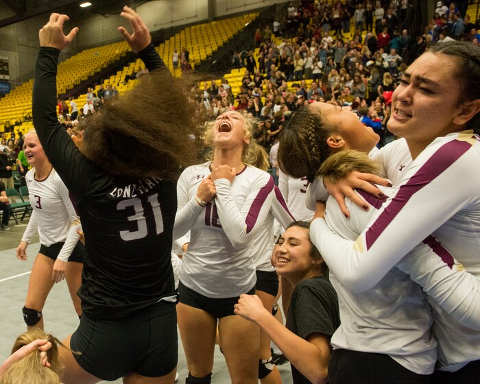 (Rick Egan  |  The Salt Lake Tribune)    The Lone Peak Knights celebrate their win over the Pleasant Grove Vikings, for the 6A volleyball championship, at Utah Valley University, Saturday, November 4, 2017.