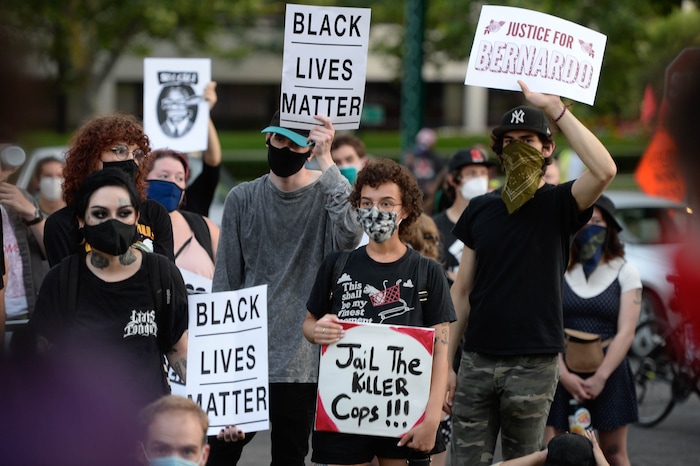 (Francisco Kjolseth  |  The Salt Lake Tribune) As part of national day of protest against police crimes, the National Alliance Against Racist and Political Repression, the Salt Lake Civilian Police Accountability Council and other groups gather at the mansion of Governor Gary Herbert on Saturday, July 18, 2020, to demand for a special session to repeal HB 415, which prohibits municipalities from establishing a board or committee with regulatory power over police departments.