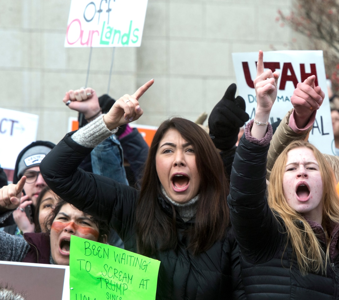 (Rick Egan  |  The Salt Lake Tribune)  Protesters chant "Shame on Hatch" as they block traffic in front of the Federal Building, at 100 South and State Street, during President Trump's visit to Salt Lake City, Monday, December 4, 2017.