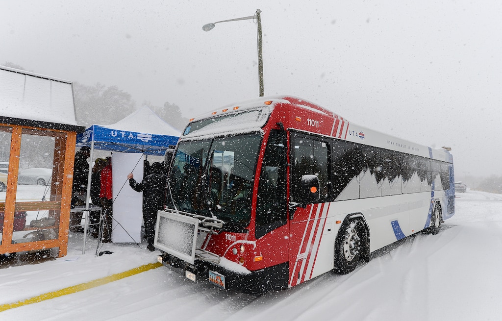 (Francisco Kjolseth  |  The Salt Lake Tribune) UTA and Central Wasatch Commission members gather at the Big Cottonwood Canyon park and ride lot on Monday, Nov. 25, 2019. Ski bus service to the Cottonwood canyons and to Snowbasin and Powder Mountain began Sunday, Dec. 12, 2021.