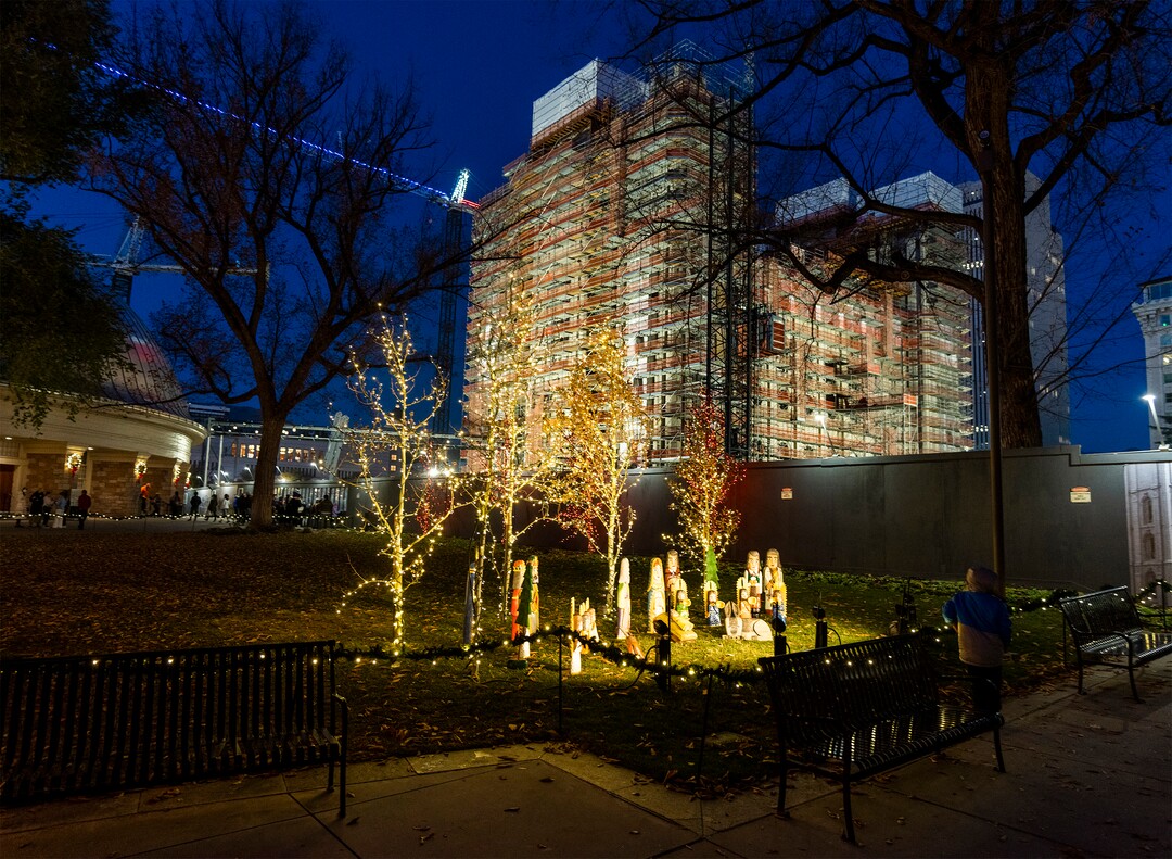 (Rick Egan | The Salt Lake Tribune) Visitors look at the lights on Temple Square, on Friday, Nov. 25, 2022.