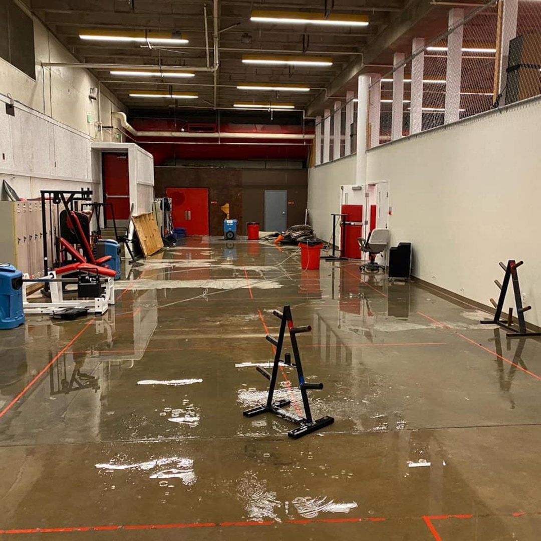 (Salt Lake City School District) The rainstorm that pounded Salt Lake City on Sunday, Aug. 2, 2021, flooded the basketball court at East High.