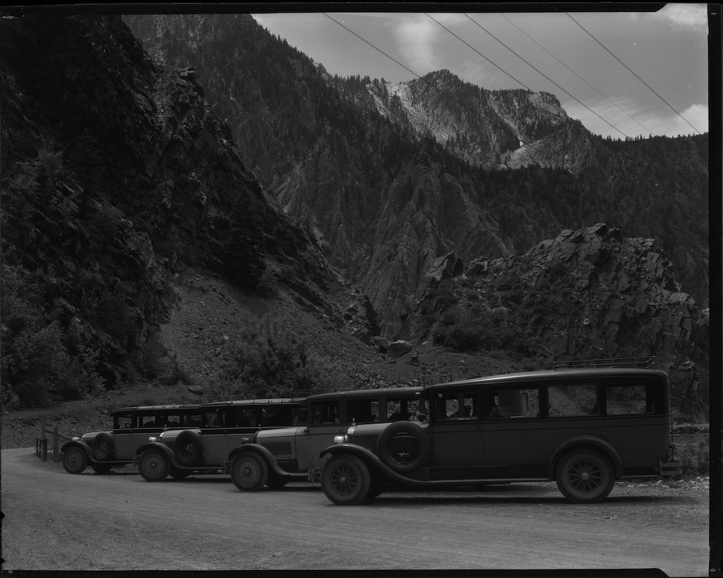 (Utah State Historical Society) Buses for the Bingham Stage Line Company line up in Big Cottonwood Canyon, circa 1926.
