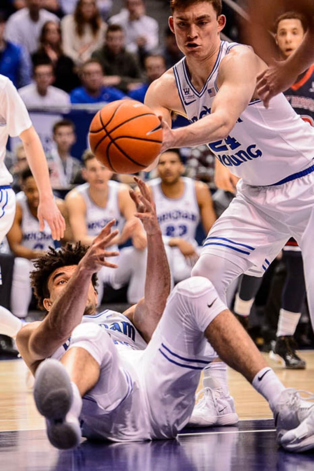 (Trent Nelson | The Salt Lake Tribune)   Brigham Young Cougars guard McKay Cannon (24) and Brigham Young Cougars guard Elijah Bryant (3) react to a loose ball as BYU hosts the St. Mary's Gaels, NCAA basketball in Provo, Saturday December 30, 2017.
