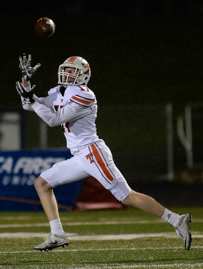 (Francisco Kjolseth  |  The Salt Lake Tribune)  Timpview's Hunter Erickson pulls in the team's first touchdown in game action between Timpview at Corner Canyon on Thursday, Sept. 21, 2017.