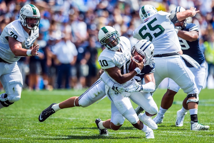 (Chris Detrick  |  The Salt Lake Tribune)  Brigham Young Cougars defensive lineman Sione Takitaki (16) sacks Portland State Vikings quarterback Jalani Eason (10) during the game at LaVell Edwards Stadium Saturday, August 26, 2017.