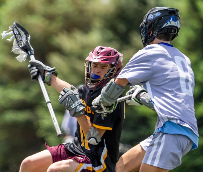 (Rick Egan | The Salt Lake Tribune) Tanner McCurdy (15) Viewmont, collides with James Livingston, Pleasant Grove, in the Division C championship game between the Viewmont Vikings and the Pleasant Grove Vikings, in Layton, on Saturday, May 29, 2021.