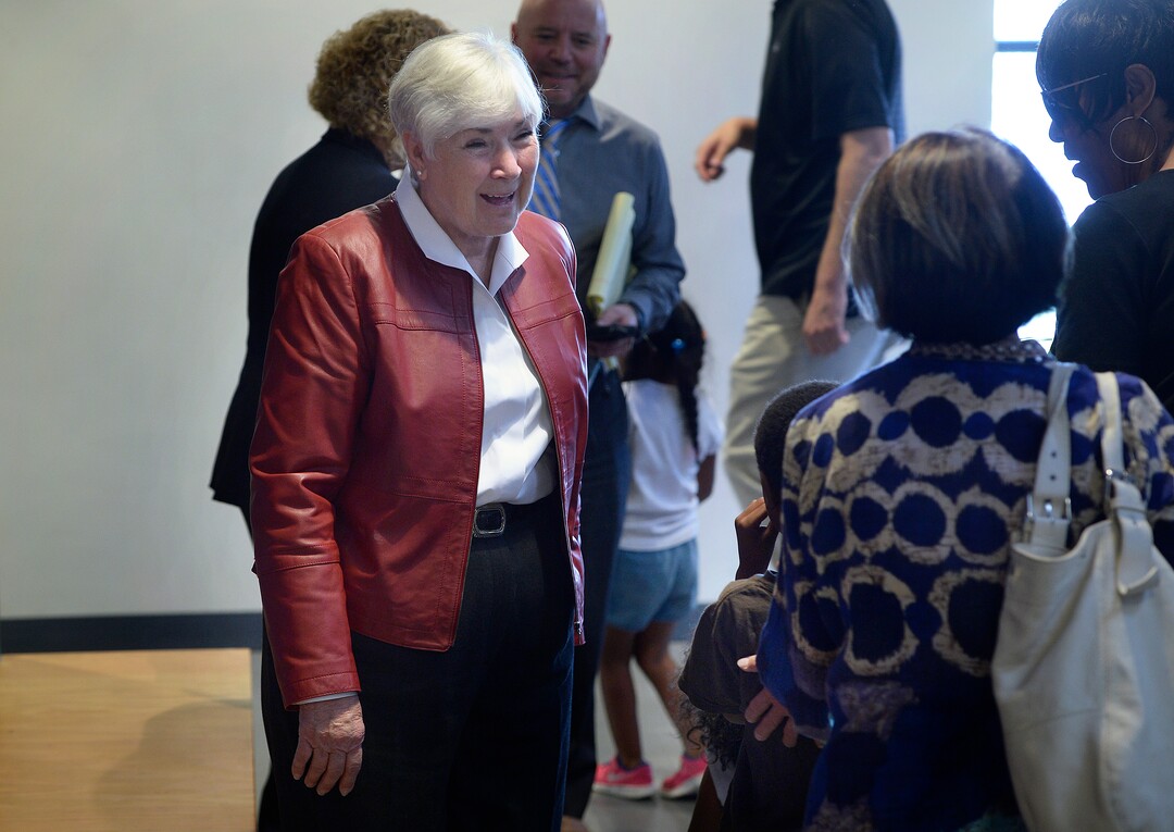 (Scott Sommerdorf   |  The Salt Lake Tribune)   Gail Miller stops in the hallway to speak with the Tillman family who had come to the VOA, Utah Homeless Youth Resource Center to visit a family member. Gail Miller and the Miller family earlier had made a challenge grant of up to 10 million dollars to fund future homeless programs and services at the VOA, Utah Homeless Youth Resource Center, Thursday, August 17, 2017. 
