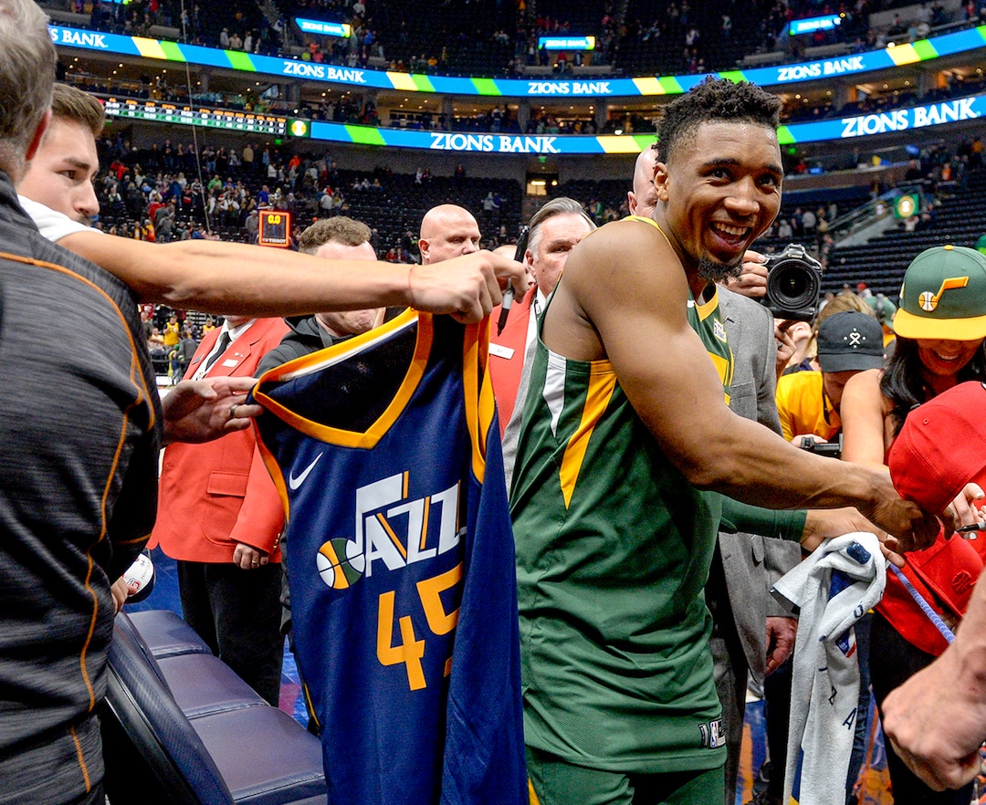 Leah Hogsten  |  The Salt Lake Tribune  Utah Jazz guard Donovan Mitchell (45) celebrates the win with fans. The Utah Jazz defeated the Portland Trail Blazers, 117-96, Christmas night at Vivint Smart Home Arena.
