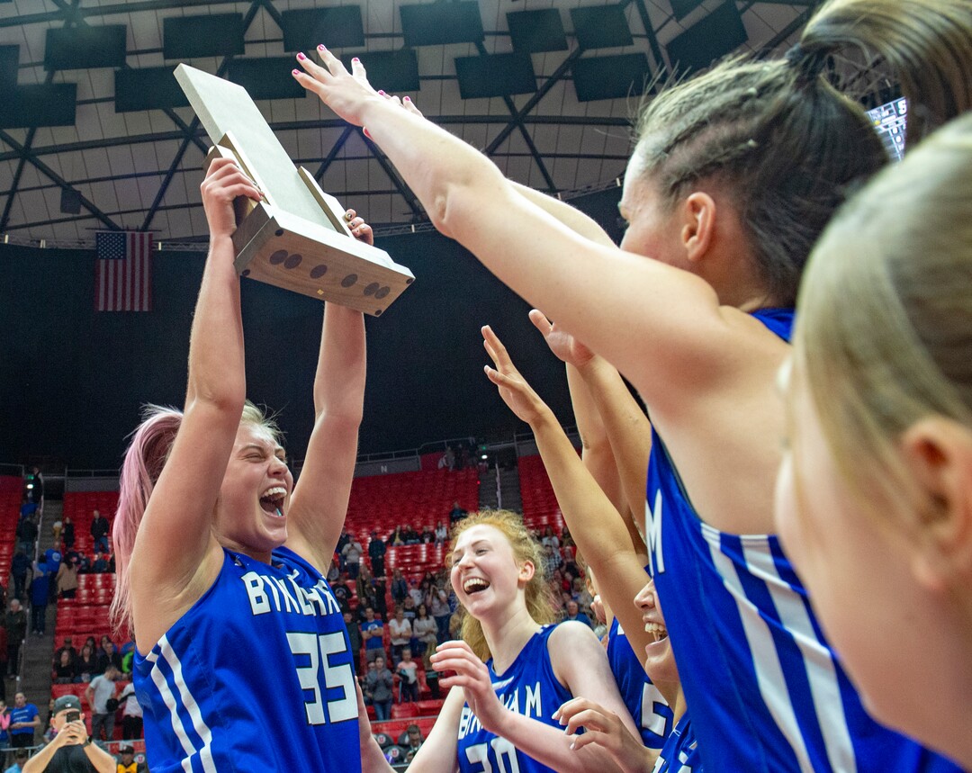 (Rick Egan  |  The Salt Lake Tribune)   Jycee  Lichtie  (35) hoists up the trophy as at the Bingham Miners celebrate their 59-51 win over the Fremont Silverwolves, in the 6A championship game, at the Jon M. Huntsman Center, Saturday Feb. 29, 2020