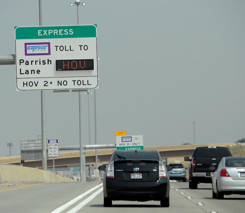 (Al Hartmann | Tribune file photo) Traffic moves along I-15 northbound between Salt Lake City and North Salt Lake in 2015.  HOV lane at far left.